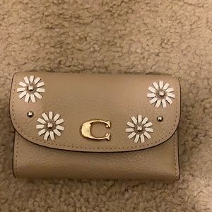 Authentic Coach small clutch  leather wallet in tan.